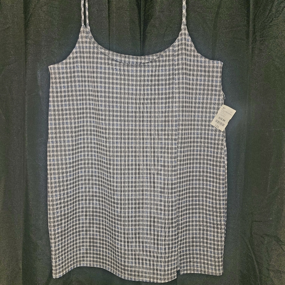 Cute skirt with straps that go over shoulder. Brand new with tags.